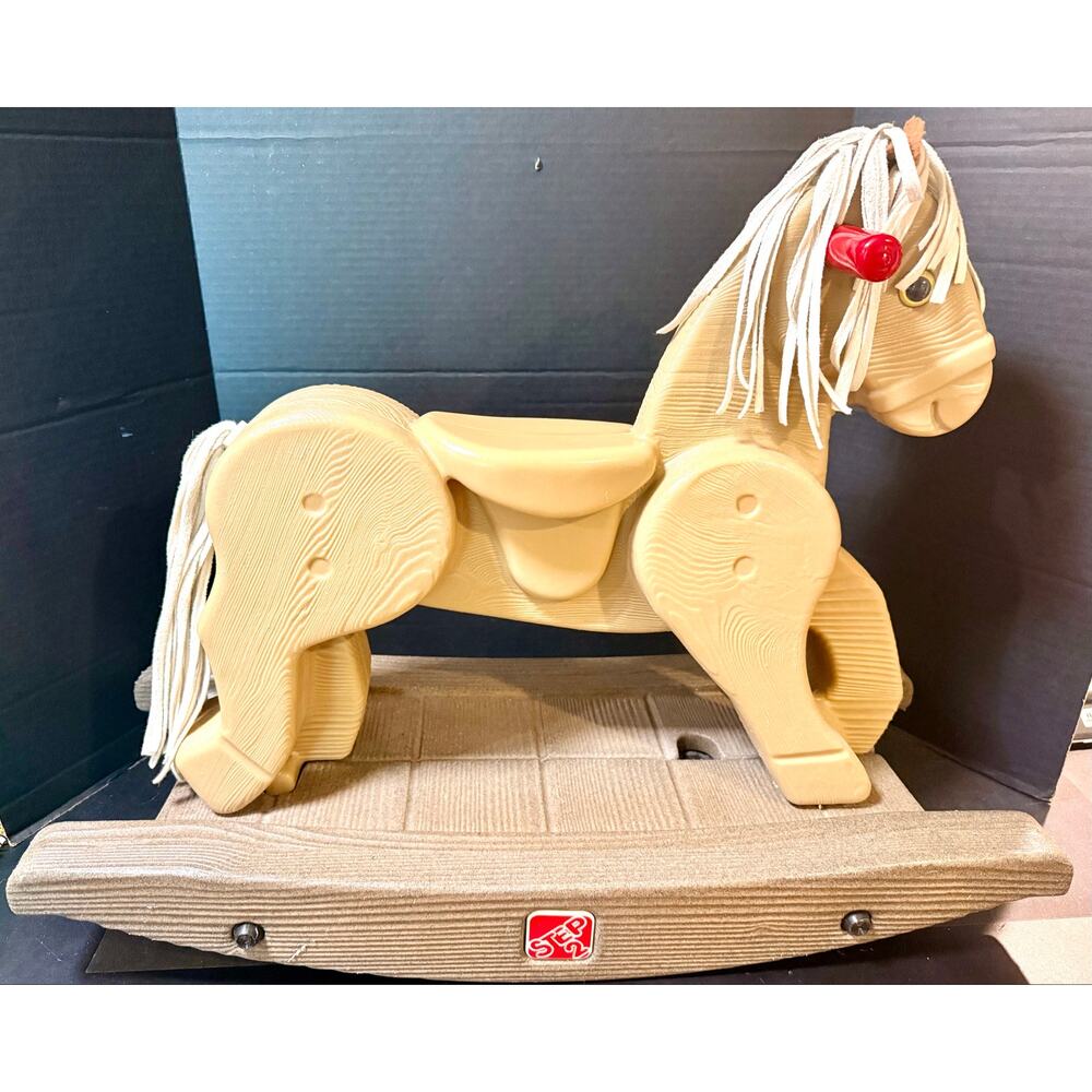 Step2 rocking horse beige plastic resembling wood grain leather hair sounds